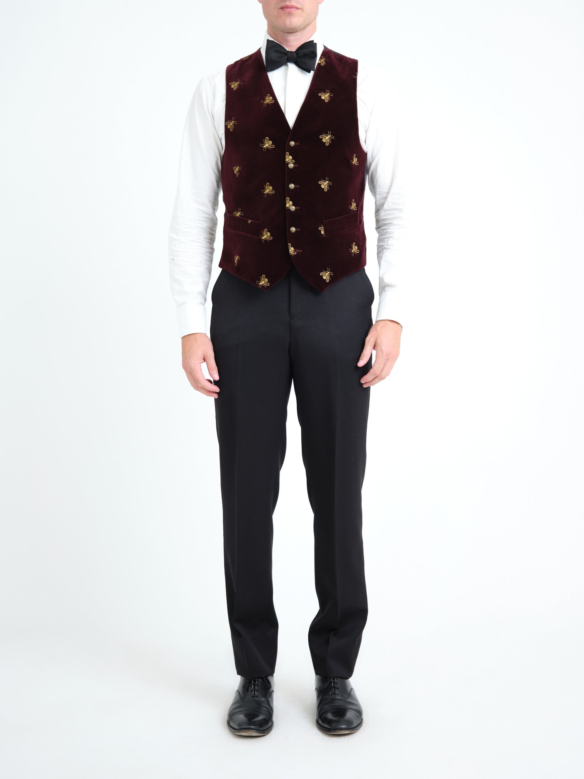 Burgundy velvet single-breasted waistcoat with gold embroidered bees — front