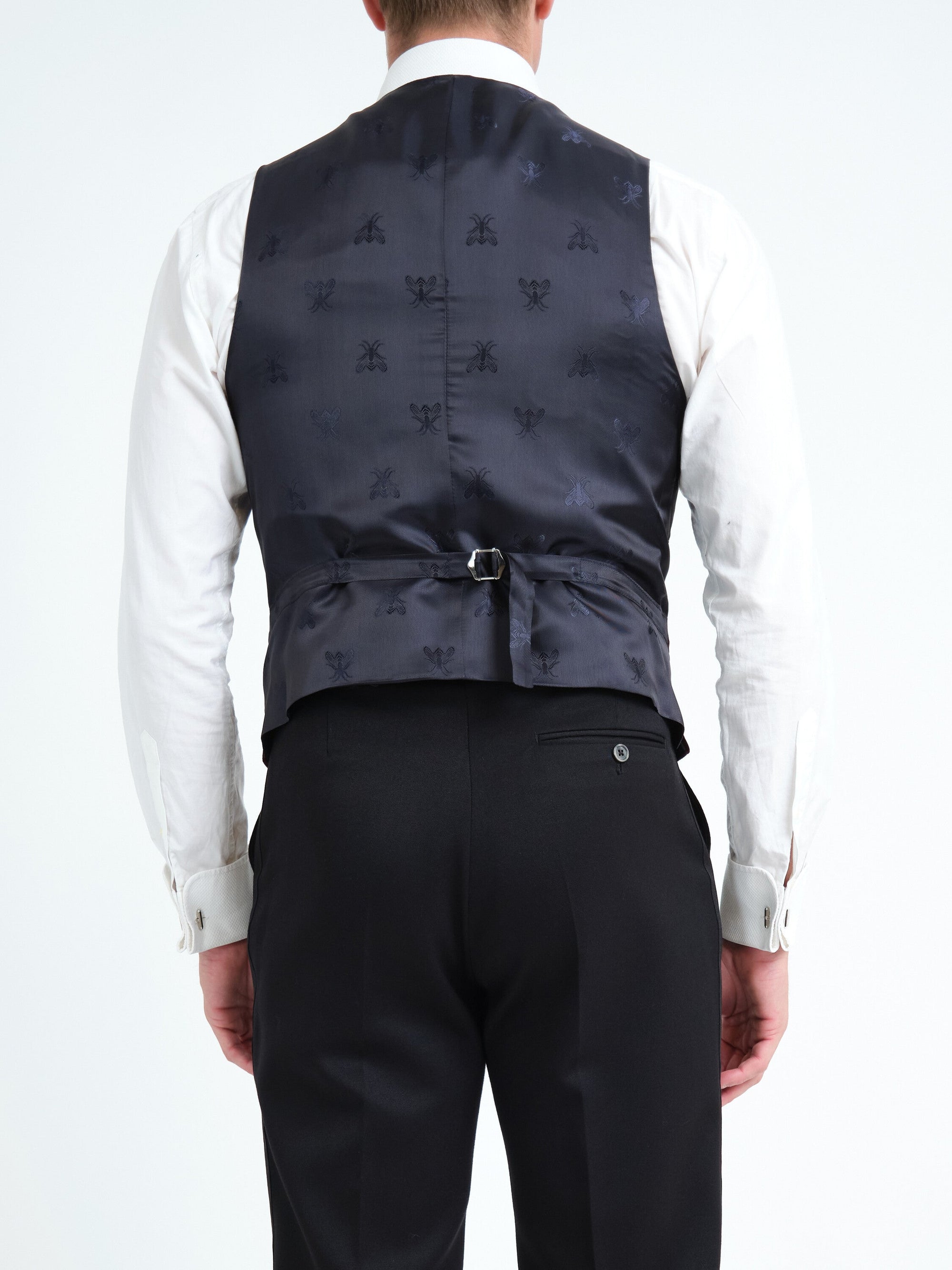 Burgundy velvet single-breasted waistcoat — back detail, adjustable buckle strap